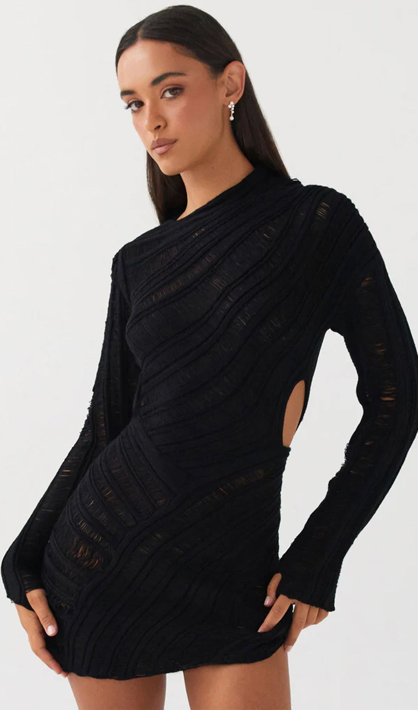 Sheer. Sultry. Unforgettable. The Hollow Out Mini Dress is made to steal the spotlight. 🔥